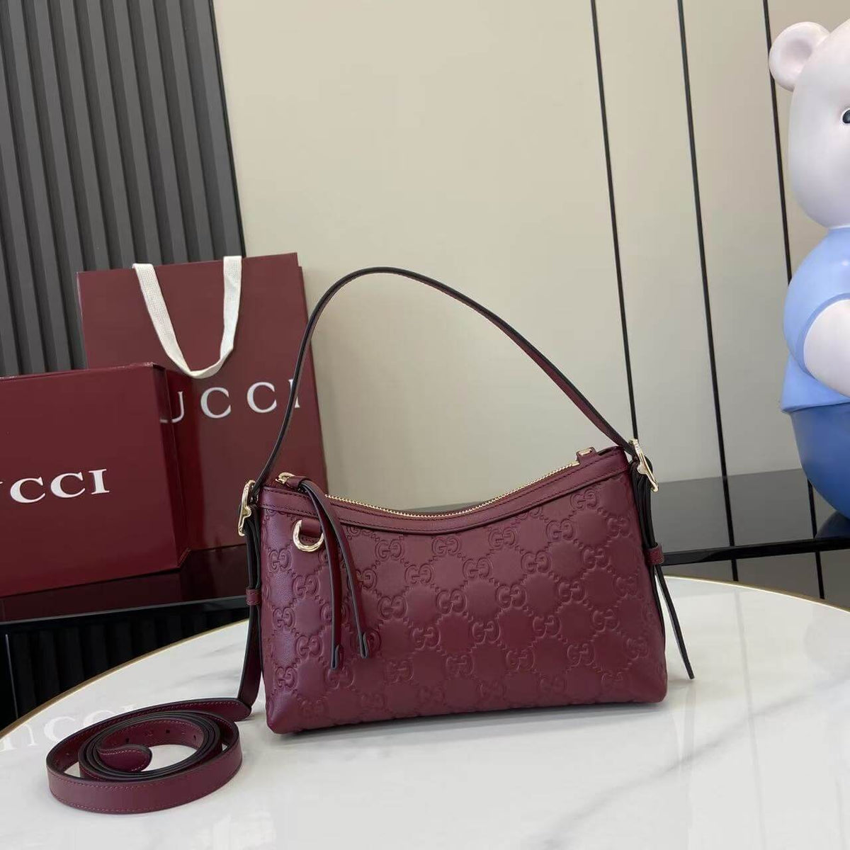 Gucci Emblem Embossed