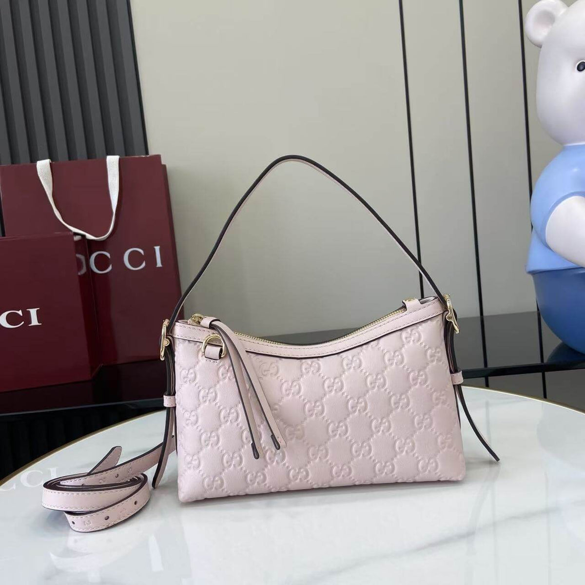 Gucci Emblem Embossed