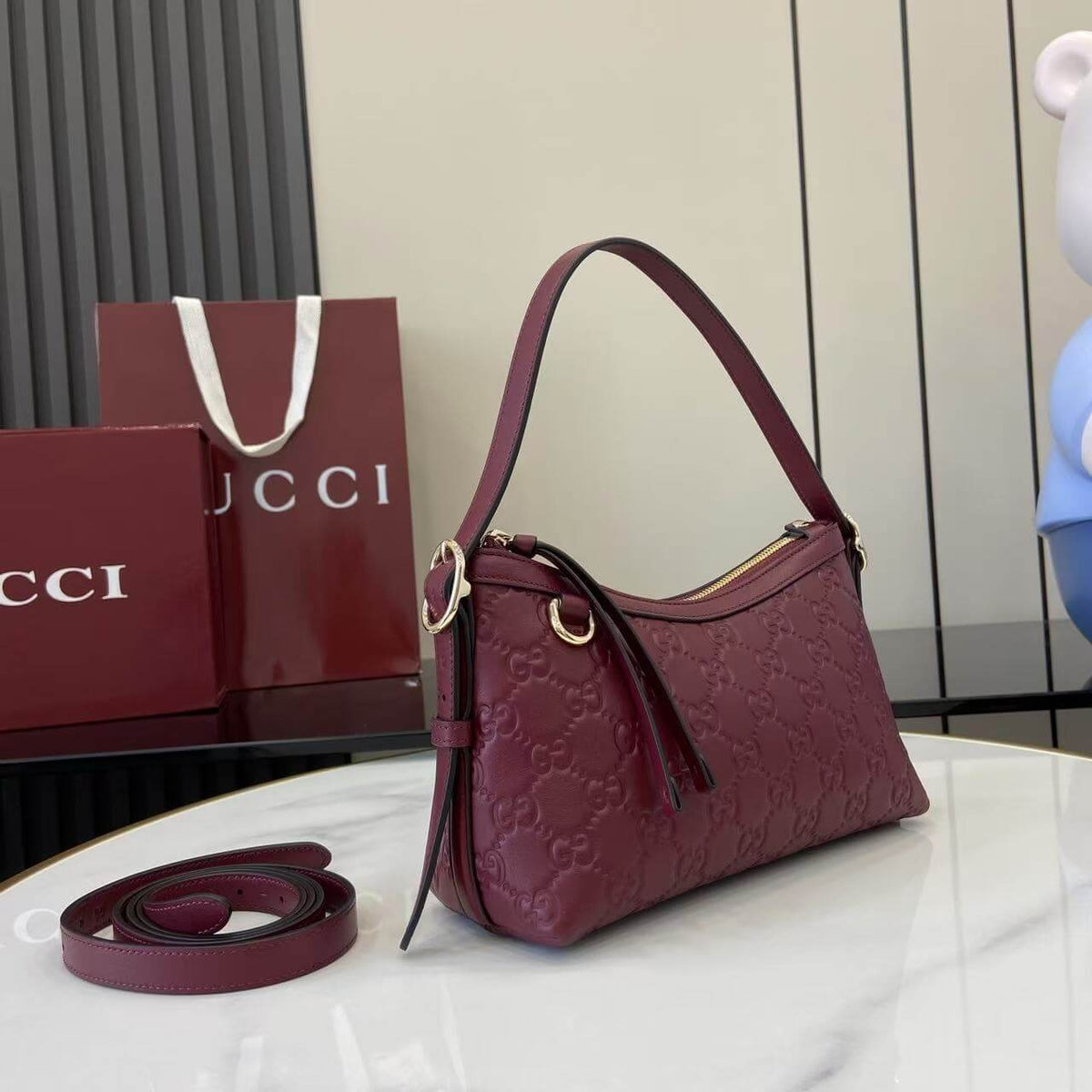 Gucci Emblem Embossed