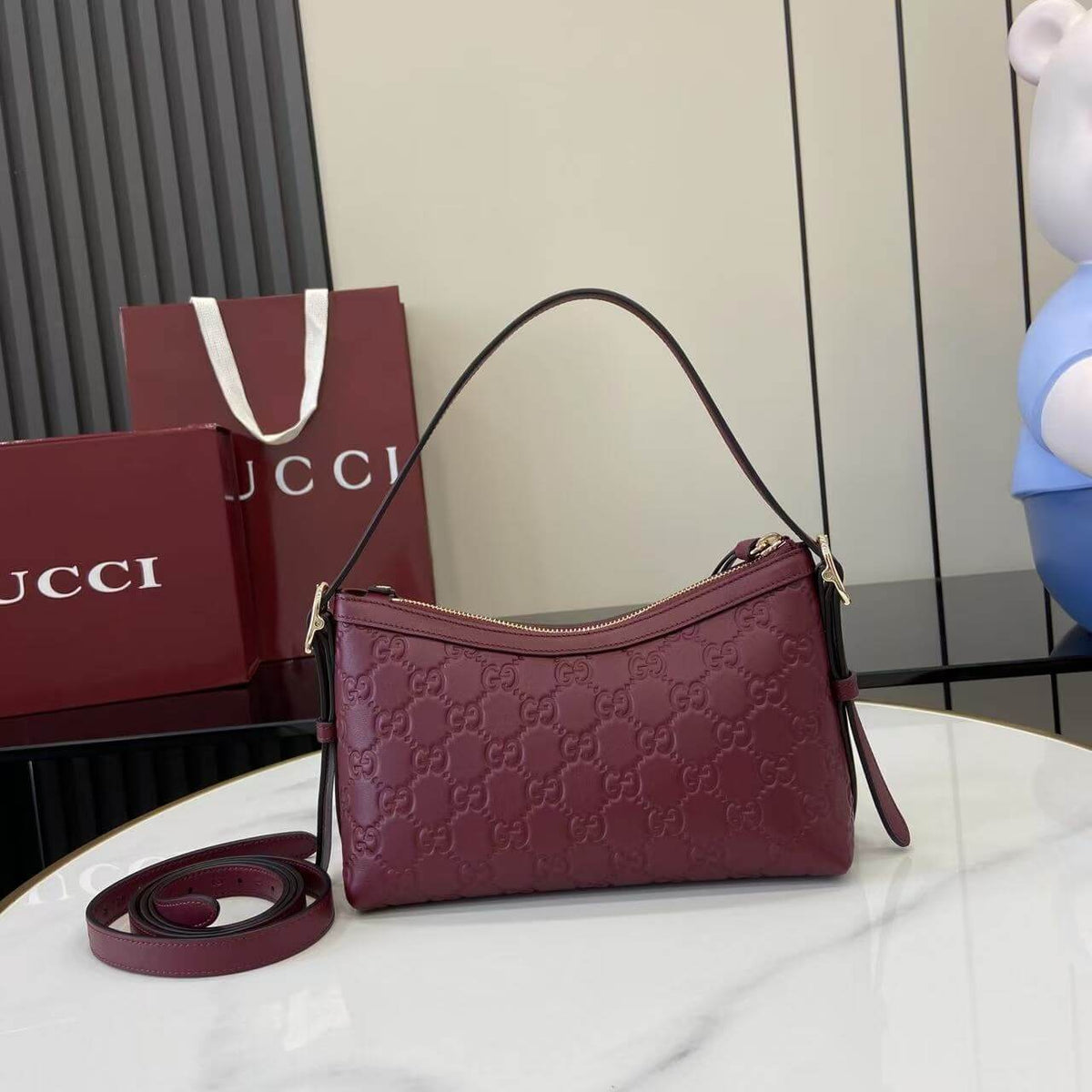 Gucci Emblem Embossed