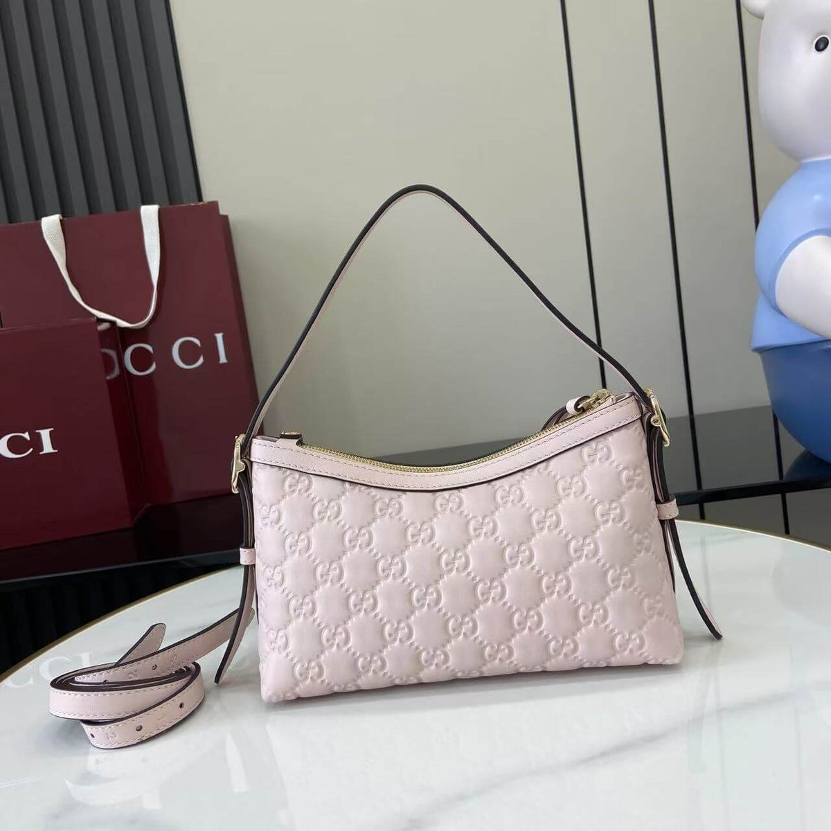 Gucci Emblem Embossed
