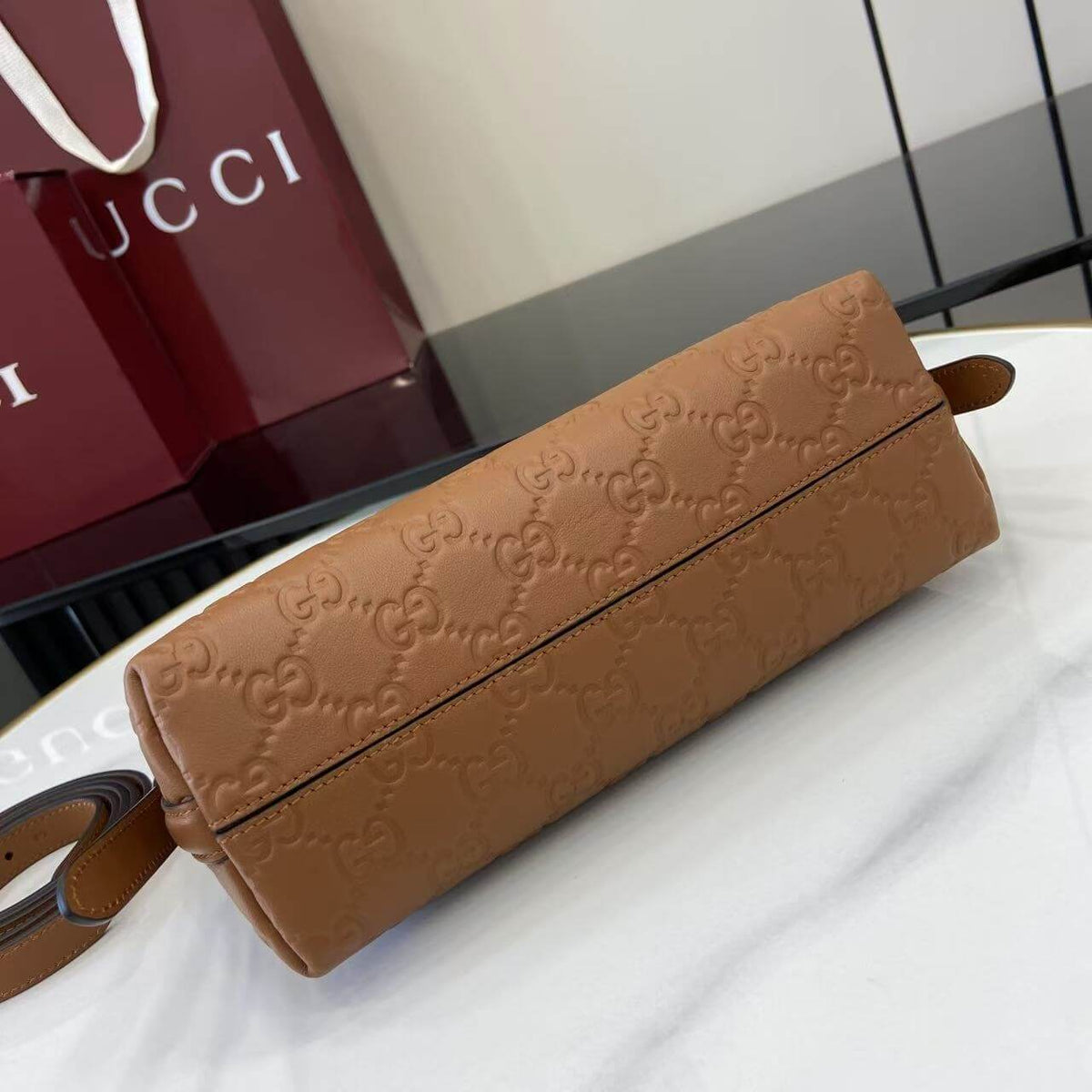 Gucci Emblem Embossed
