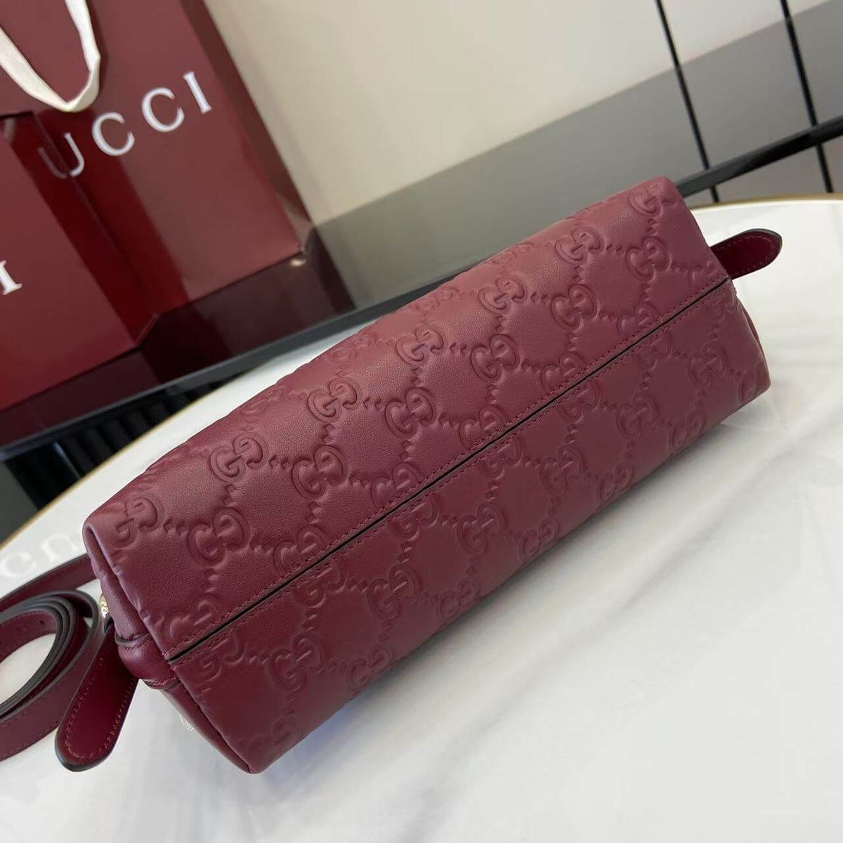 Gucci Emblem Embossed