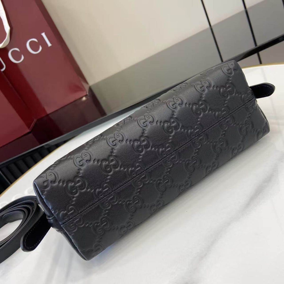 Gucci Emblem Embossed