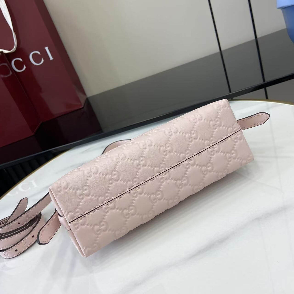 Gucci Emblem Embossed