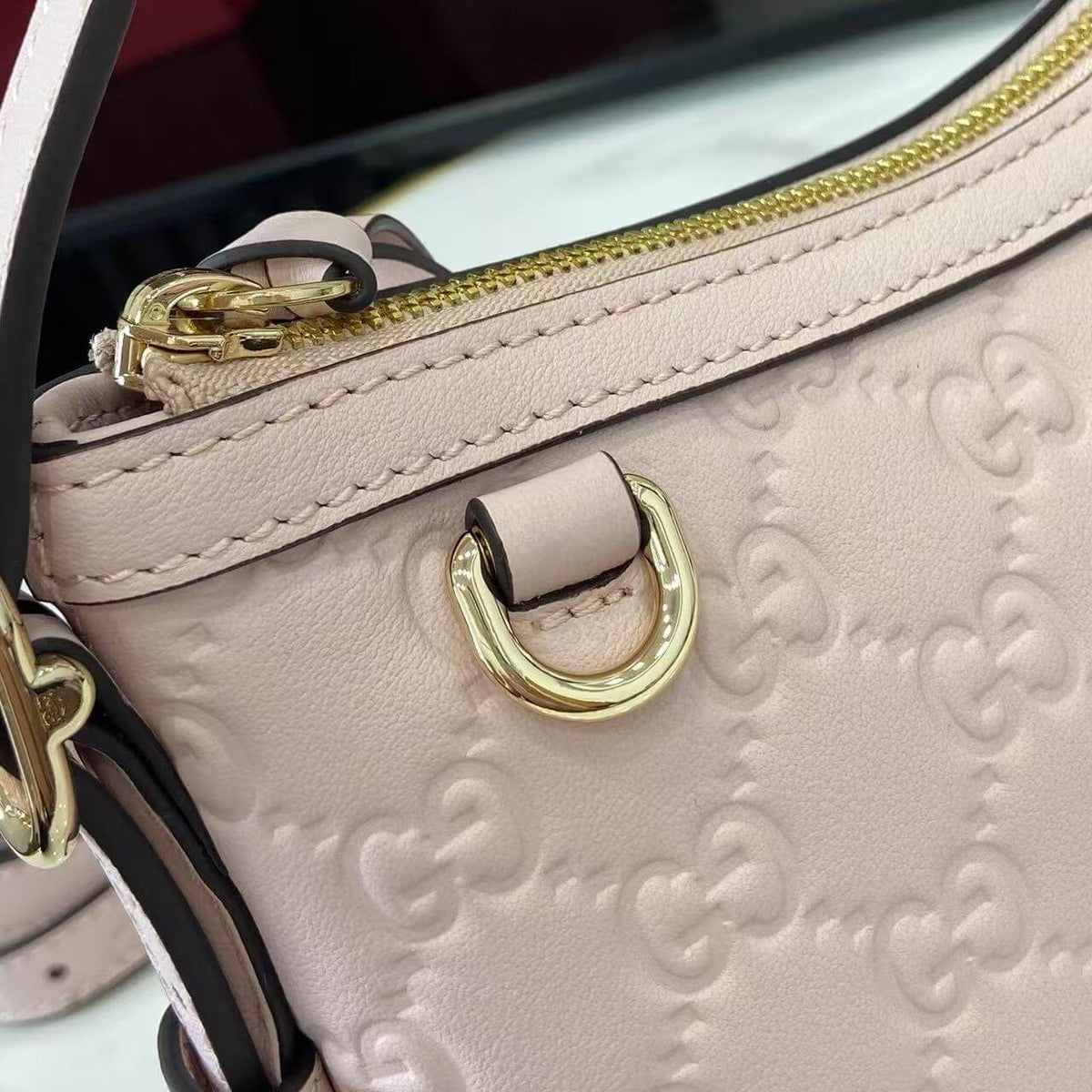 Gucci Emblem Embossed