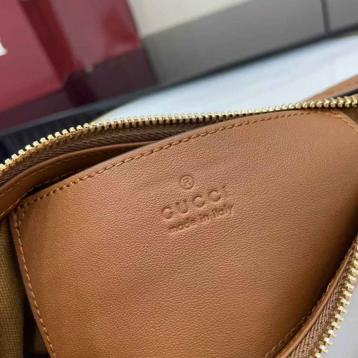 Gucci Emblem Embossed