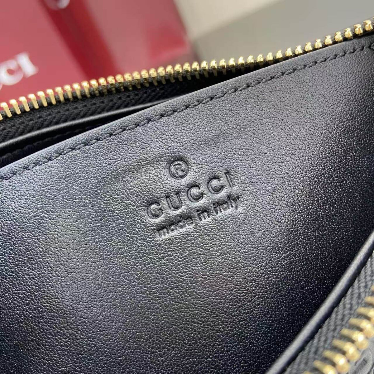 Gucci Emblem Embossed