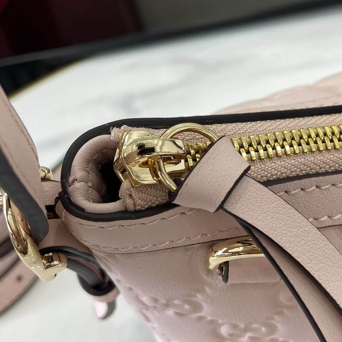 Gucci Emblem Embossed