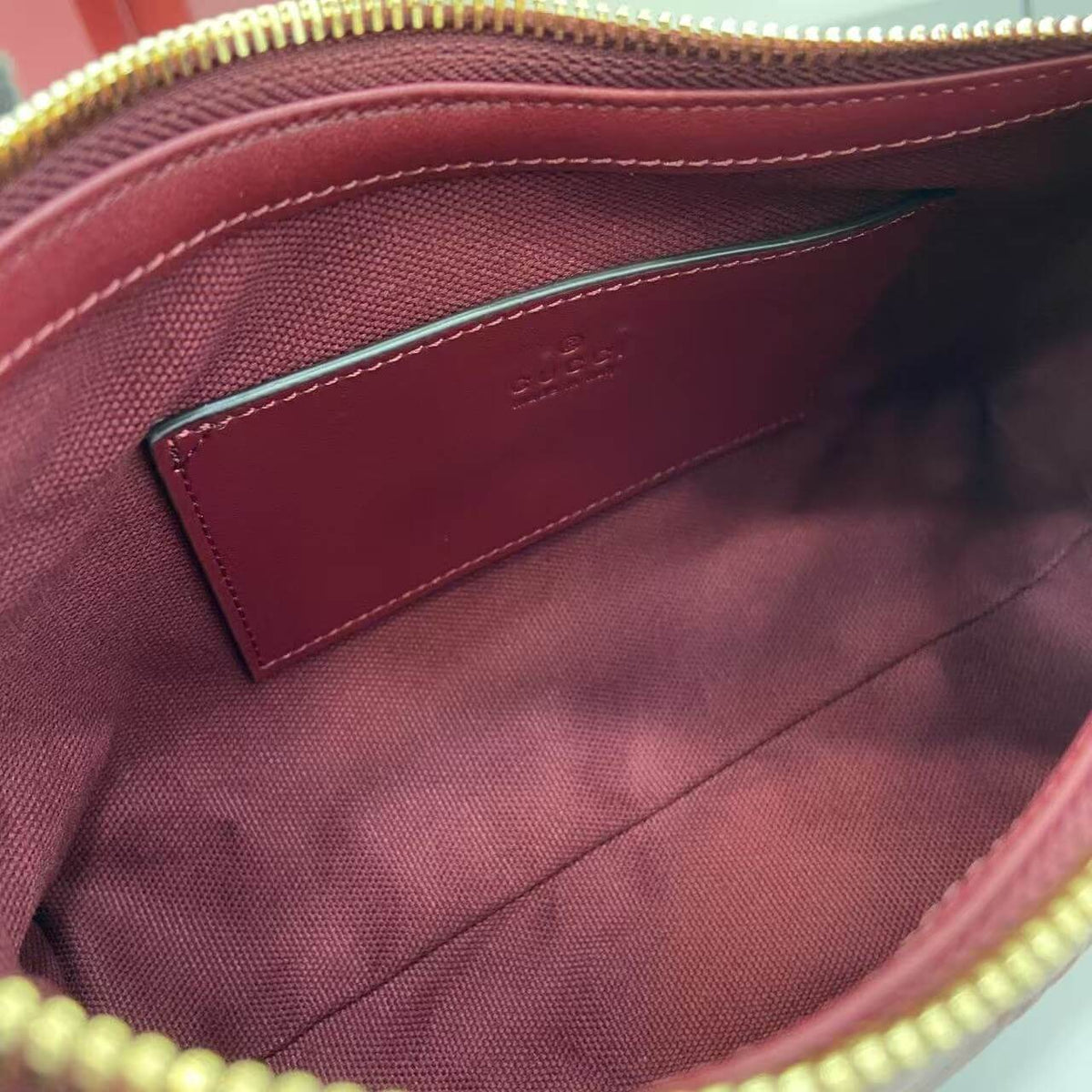 Gucci Emblem Embossed