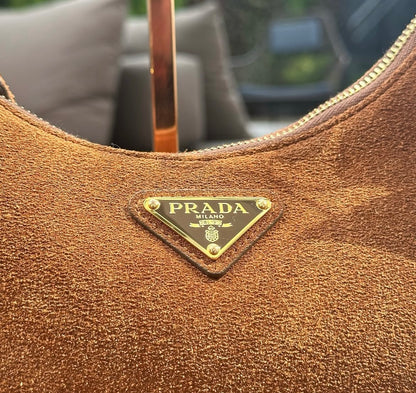 Bolsa Prada Re-Edition Mini Camurça