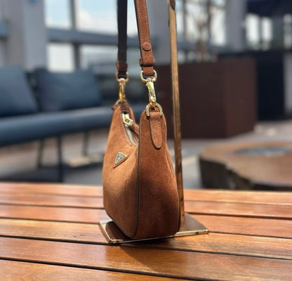Bolsa Prada Re-Edition Mini Camurça